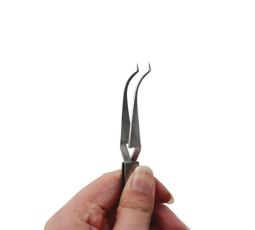 Реверсний пінцет для щічних трубок